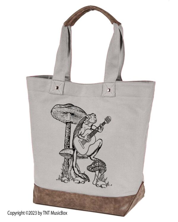 Frog playing guitar graphic on Sand canvas tote