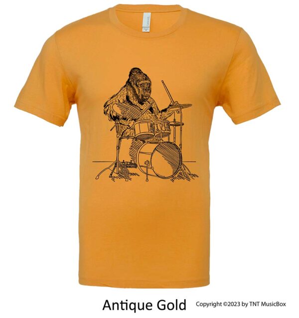 Gorilla playing drums on an antique gold shirt.