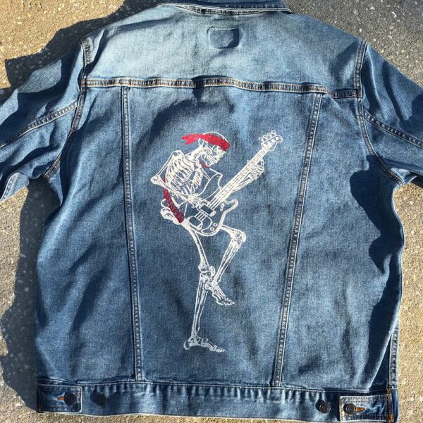 Skeleton Playing Bass on a Denim Jacket