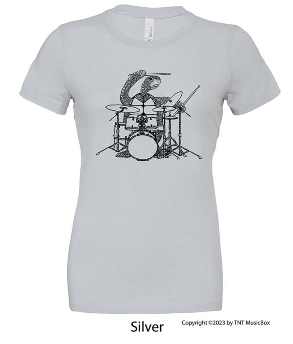 Turtle playing drums on a Silver shirt.