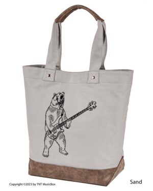 Bear Playing Bass graphic on Sand colored14oz. canvas tote. Comes Cottom=n lined with zippered pocket and magnetic snap closure.