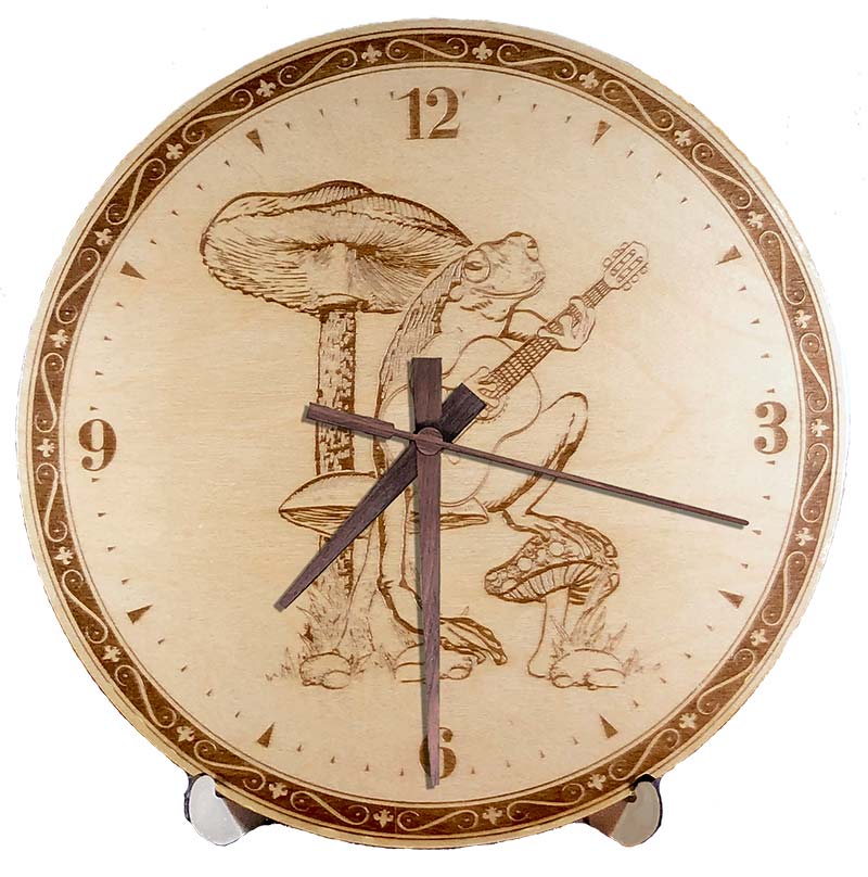 Frog Playing Guitar Wall Clock. Laser engraved, 11.25" in diameter. 6mm Baltic Birch.