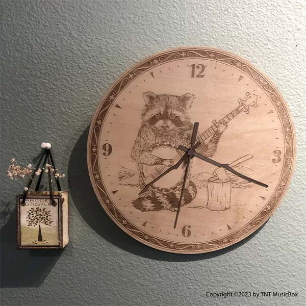 Raccoon Playing Banjo Wall Clock. Laser engraved, 11.25" in diameter. 6mm Baltic Birch.