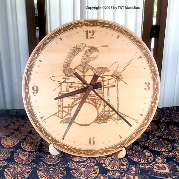 Turtle Playing Drums Wall Clock. Laser engraved, 11.25" in diameter. 6mm Baltic Birch.